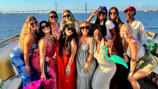 mobilebanner03 A private group of friends cheering and enjoying a customized harbor tour on the Friki Tiki in Charleston, SC.