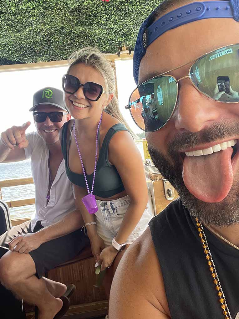 Friends grooup on a party boat