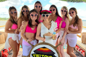 The Friki Tiki party boat cruising through Charleston Harbor, demonstrating what a full boat party includes with Tiki Tours of Charleston.